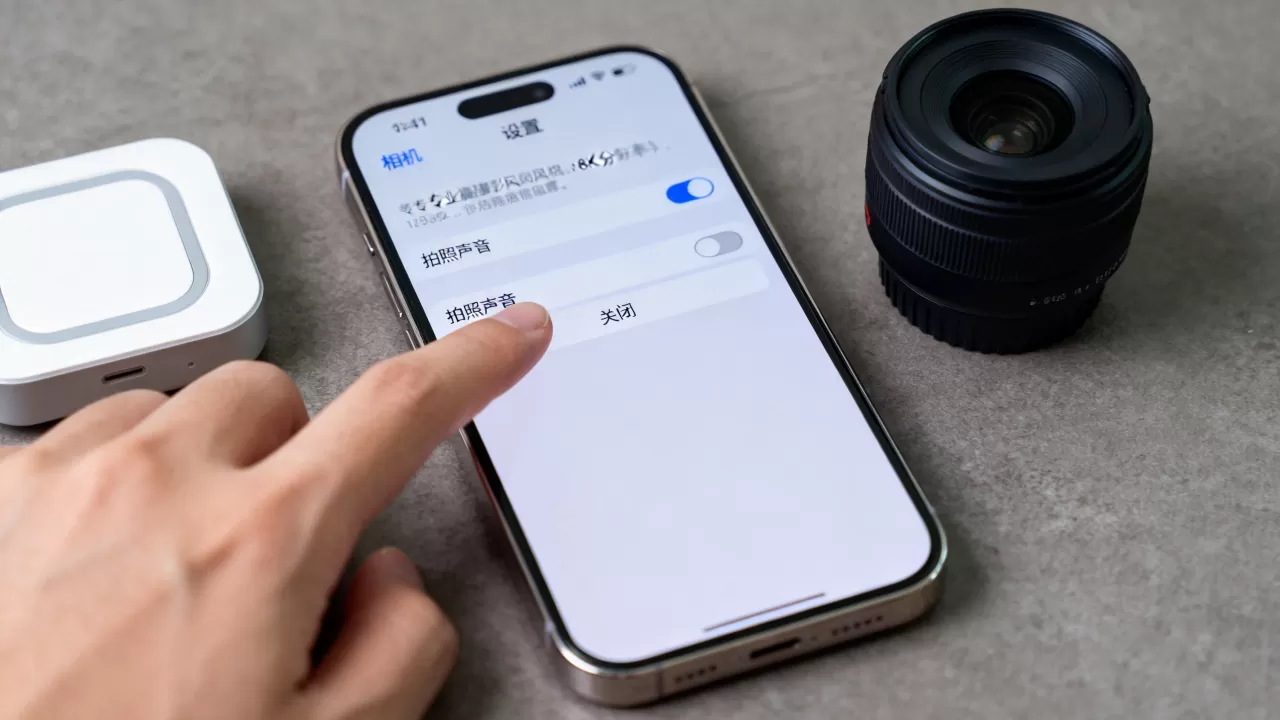iphone照相机拍照声音怎么关，iPhone拍照静音设置方法